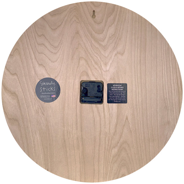 "Moments in Time" Round Clock