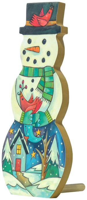 Snowman cutout sculpture with pegs