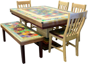 A colorful, traditional patchwork design with inspiring icons surrounding a&nbsp; handcrafted dining table with 4 dining chairs and&nbsp;1 wood bench.