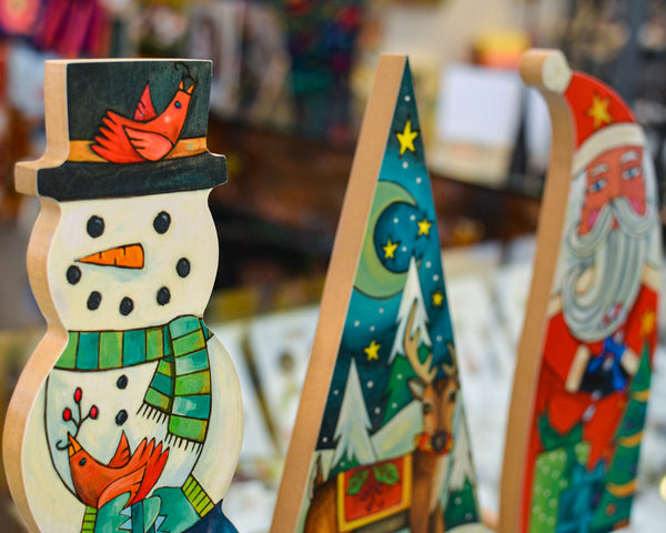 Snowman, reindeer, and Santa wood Christmas scuptures
