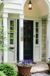 Example of Sincerely, Sticks "3" house number plaque at a front door