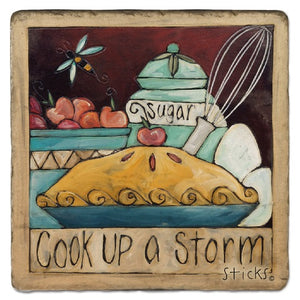 Quote Marble Trivet – "Cook up a storm" baking trivet will come in handy when you're whipping up some freshly baked pies on a white background