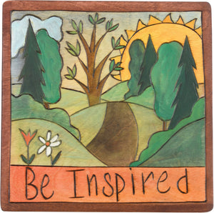 Sticks handmade wall plaque with "Be Inspired" quote and rolling landscape