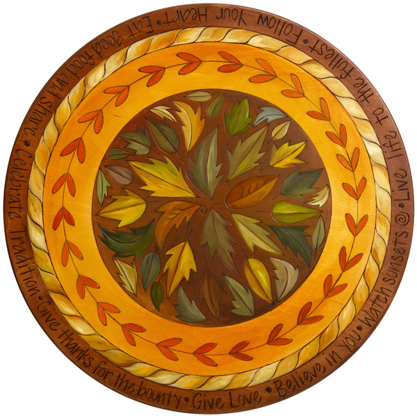 Sticks Handmade 20"D lazy susan with warm hues and fall foliage