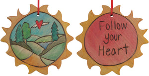 Sun Ornament –  Lovely "Follow your Heart" ornament with rolling landscape and heart with wings