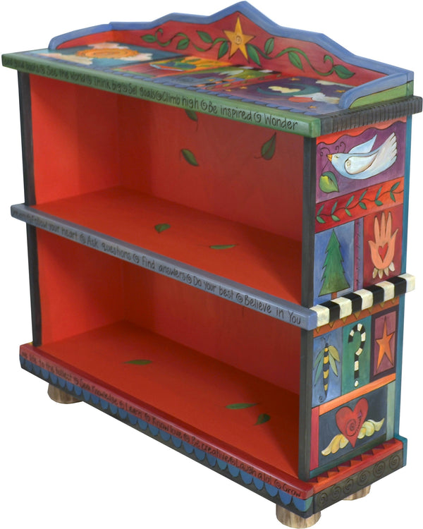 Short Bookcase –  Colorful bookcase with symbolic block icons painted in rich hues