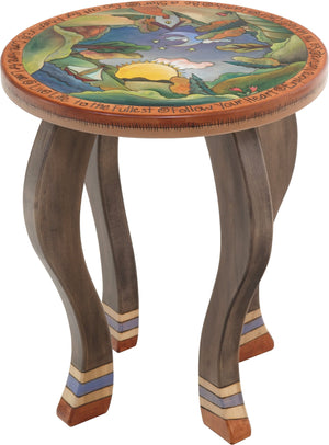 Round End Table –  Handsome end table with rolling landscape in the round and sun and moon motifs