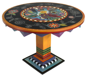 Sticks handmade dining table with colorful folk art design and floral scratchboard border