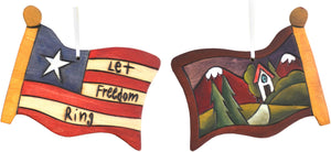 Flag Ornament –  Let Freedom Ring flag ornament with home and mountain motif