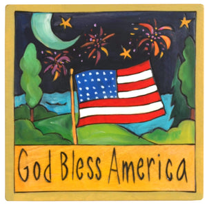 "God bless America" flag and fireworks patriotic plaque design