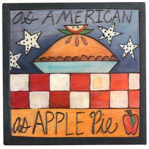 "As American as apple pie" plaque with a pie in a red white and blue setting