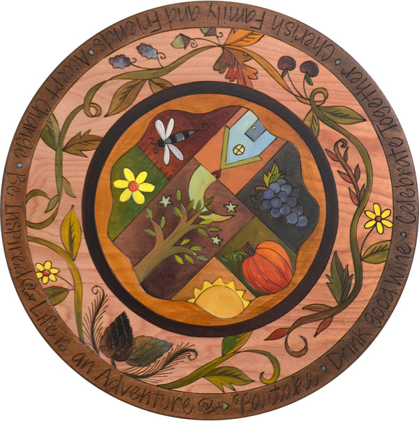 Sticks Handmade 20"D lazy susan with autumnal vines and patchwork quilt design