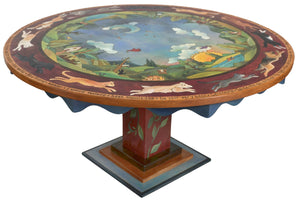 72" Round Dining Table –  "Home is Where the Heart is" round dining table with cats and dogs chasing one another around a beautiful landscape motif