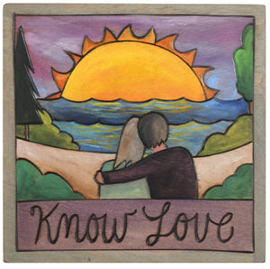 Sticks handmade wall plaque with "Know love" quote and couple at the beach at sunrise or sunset scene