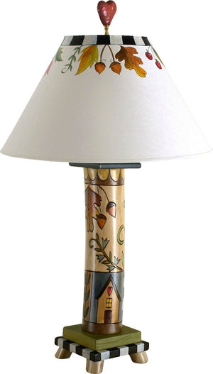 Log Table Lamp –  Elegant table lamp with flora and vine motifs