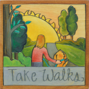7"x7" Plaque –  "Take Walks" plaque with a furry friend on a hillside