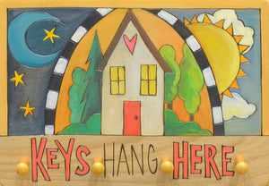 Horizontal Key Ring Plaque –  "Keys hang here" plaque with a home splitting a curtain revealing a sun and moon
