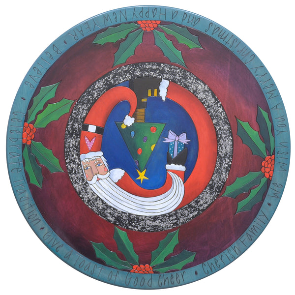 20" Lazy Susan – Whimsical Santa holding a present with holly and glitter accents