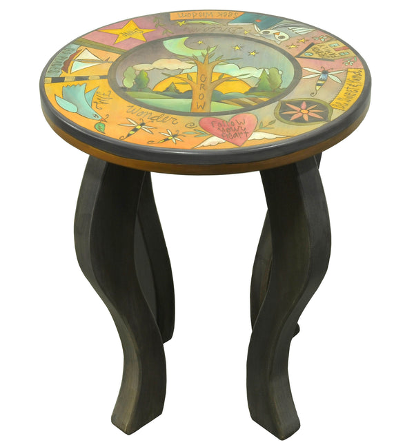 A "grow" tree of life is surrounded by floating icons and heartwarming phrases on this tabletop