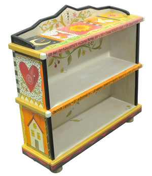 Fun crazy quilt bookcase design featuring polka-dots and floral vine accents