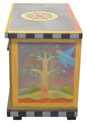 Small Dresser –  Eclectic dresser with boxed icon drawer fronts, tree of life scenes on sides, and flower medallion on top right view