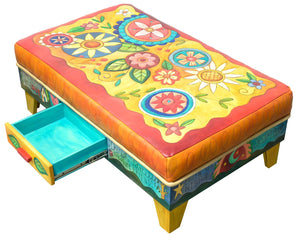Ottoman with Drawer – Bright and beautiful floral ottoman with inspirational phrases along its wooden sides view with open drawer