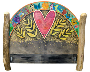 Queen Bed – Beautifully bold bed with a giant heart and floating icons above and coordinating footboard with stacked icons in a landscape motif headboard view