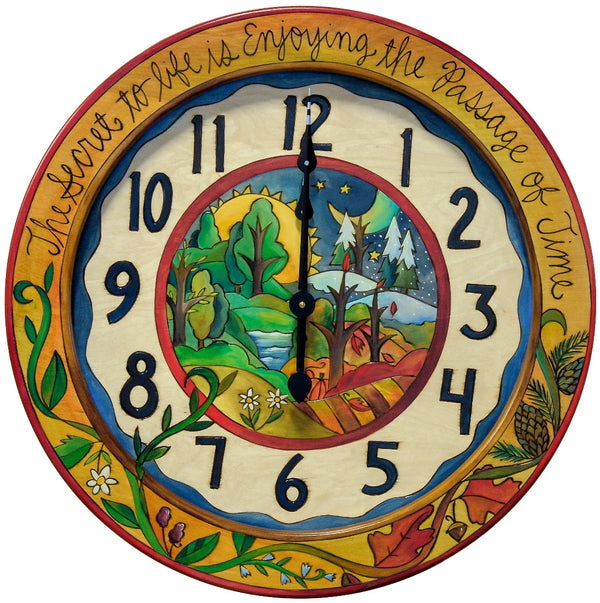 24" Round Wall Clock – Colorful clock in a four seasons design with a landscape in the center and coordinating vine resting on the bottom edge