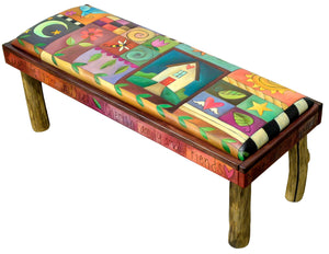 4ft Bench with Leather Seat – Crazy quilt bench seat design with warm red, orange, and pink word border and log legs main view