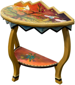Half round table featuring a simple fall scene with depiction of the tree of life. Side view