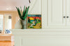 "Where the Trillium Grows" Plaque – "Oh How We Love Michigan" plaque with warm sun over the lake motif displayed on a home's fireplace mantel