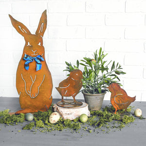 Henry Rabbit Sculpture – Dapper standing rabbit sculpture with a bowtie to celebrate spring season and Easter in a spring display with chick sculptures