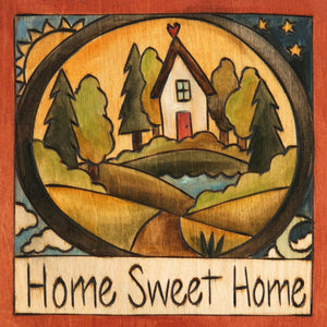 "Looks Like Home" Plaque – A Sticks home sits atop a cozy landscape front view