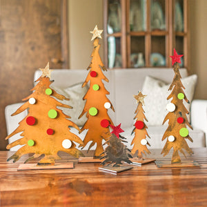 Pencil Tree Sculpture – Tall, thin pine tree sculptures that look best as a grouping but a single one will still look great with other mementos you have at home displayed with magnets as ornaments