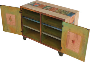 Media Buffet –  Elegant and neutral media cabinet with tree of life motifs and colorful block icons throughout
