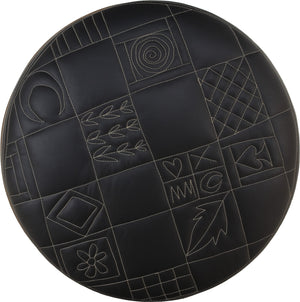 Round Ottoman –  Monochromatic and modern patchwork ottoman design achieved with contrast stitching top view
