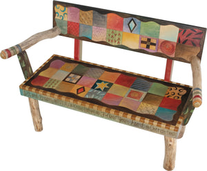 Loveseat –  Colorful quilt design with symbolic block icons 