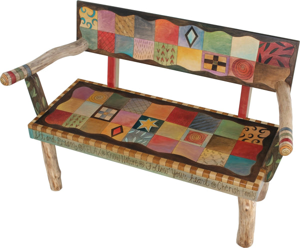 Loveseat –  Colorful quilt design with symbolic block icons