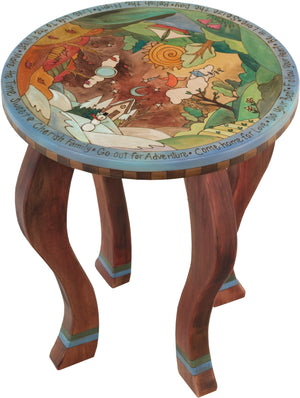 Round End Table –  Playful four seasons end table with colorfully painted scenery