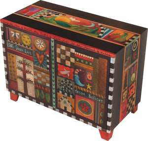 Media Buffet –  Rich folk art media cabinet with many colorful block icons and landscapes