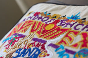 New Mexico Hand-Embroidered Pillow -  In beautiful detail this original design celebrates the State of New Mexico - from Carlsbad Caverns to White Sands to Gila Forrest to Anasazi to Mescalero - it truly is the LAND OF ENCHANTMENT!