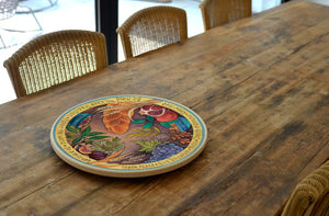 Seven species design on wood lazy susan sitting on dining table