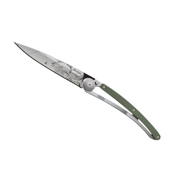 Folding knife with green handle on a white background