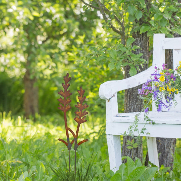 Lavender metal garden stake in grass