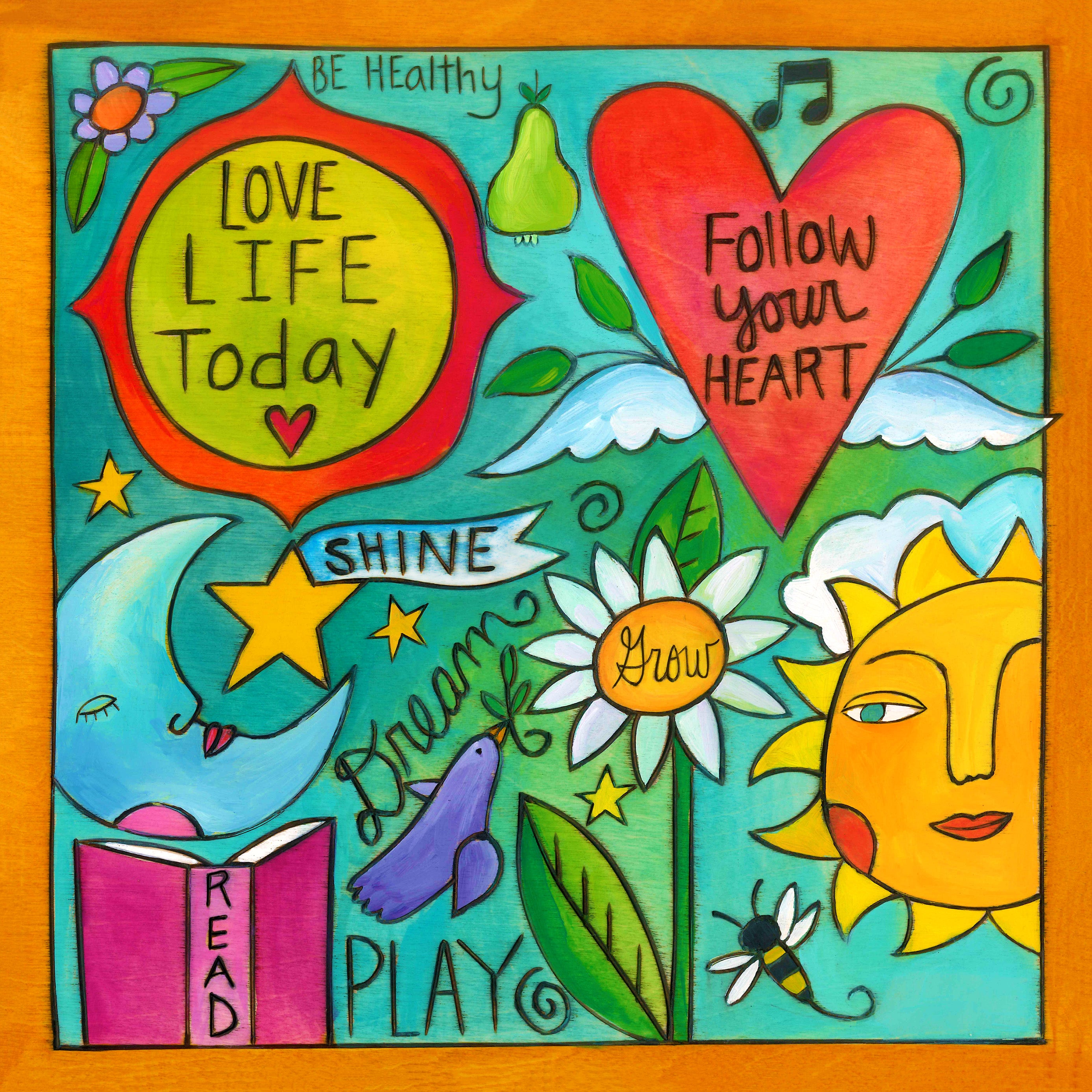 Colorful wall plaque with motivational phrases and symbols on a wooden background