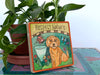Decorative sign with a dog illustration and 'Respect Nature' text, placed among plants.