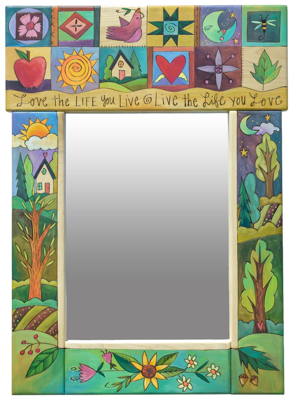 colorful mirror with icons and a day and night landscape.