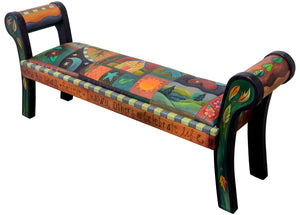 Beautiful warm colored bench with a cozy crazy quilt motif.