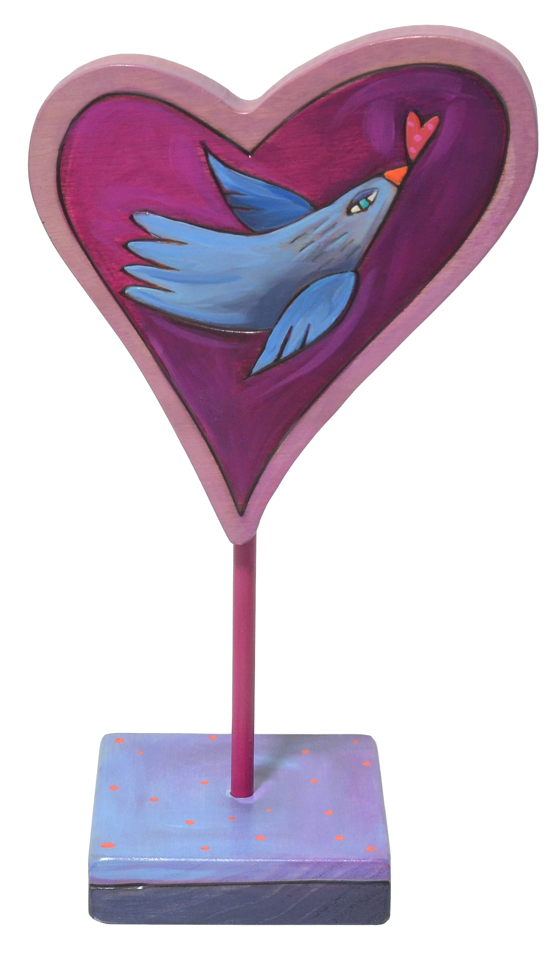 Decorative heart-shaped sculpture with a blue bird illustration on a white background