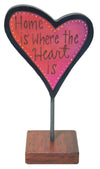 Heart-shaped sculpture with 'Home is where the heart is' text on a white background